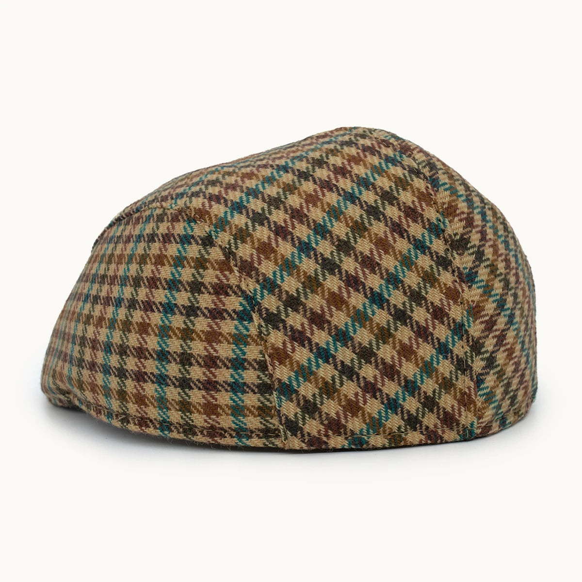 Gorra Equestrian de cashmere verde y tierra con diseño de cuadros Gorras Paula vista lateral