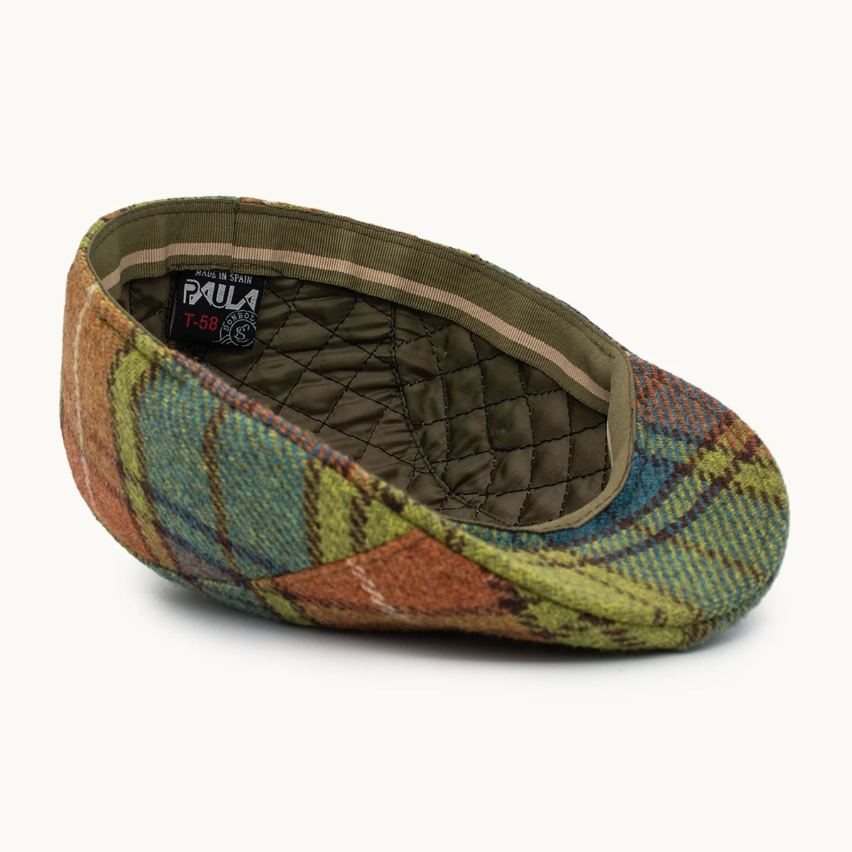 Interior de gorra Heritage de lana verde y tierra Gorras Paula con acabado artesanal