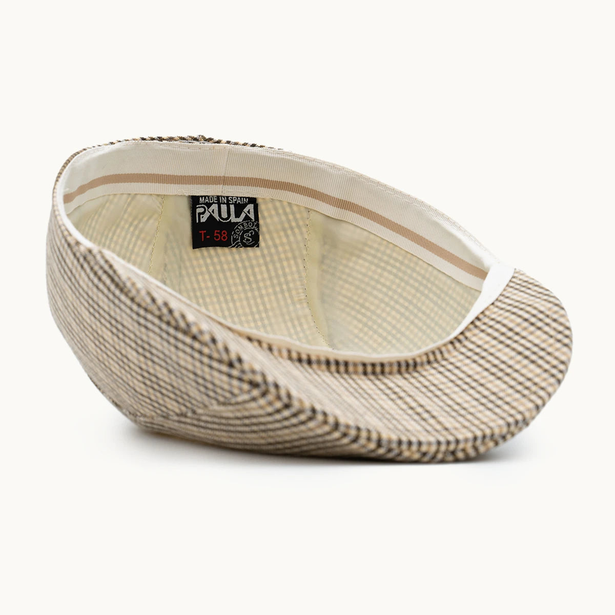 interior gorra cuadros beige con forro transpirable