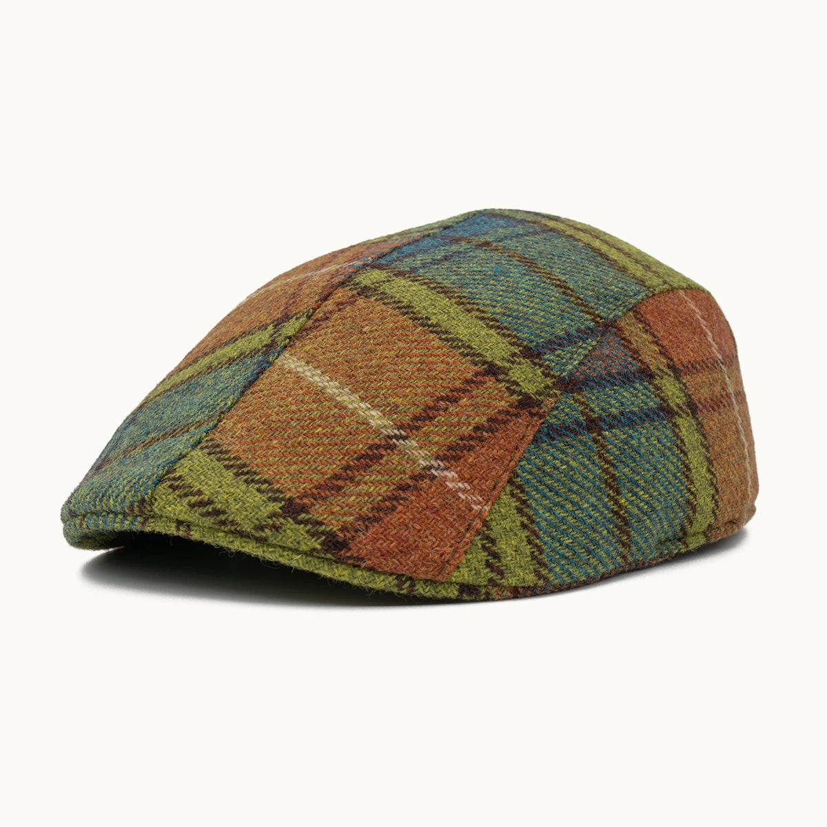 Gorra Heritage de lana en tonos verde y tierra con cuadros grandes Gorras Paula hecha en España vista frontal
