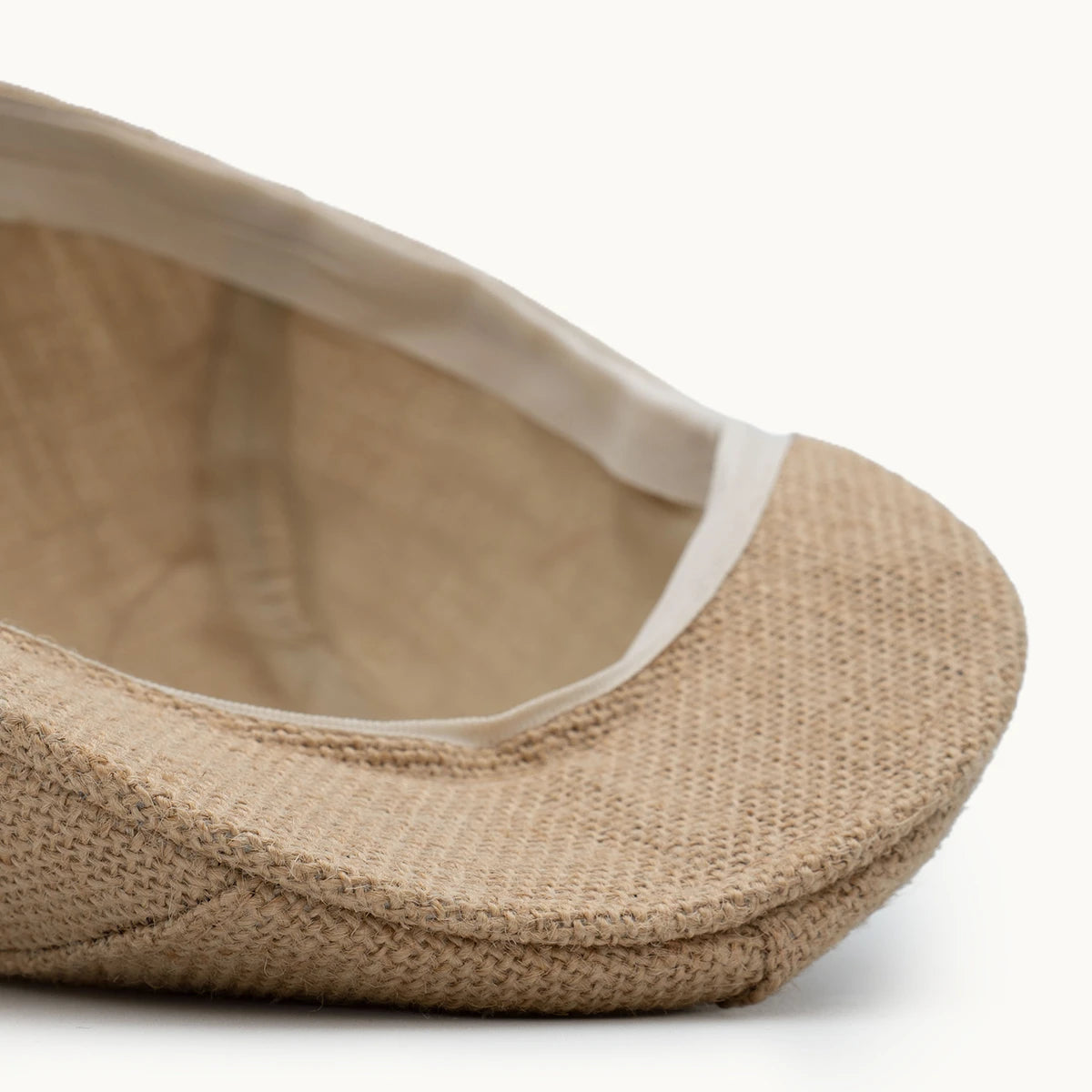 detalle interior gorra yute natural textura y acabado